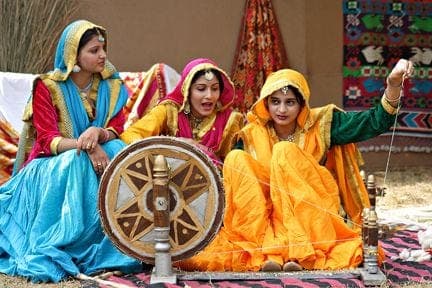 A vibrant photo from a Punjabi cultural conference.